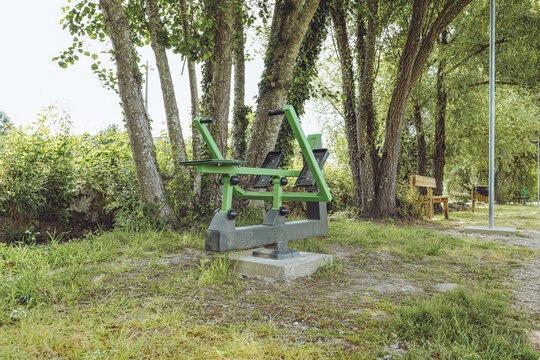 Rowing Machine (Rowing Simulator) - Outdoor Gym, Santa Comba D&atilde;o, Portugal, public fitness Calisthenics equipment in a green park environment