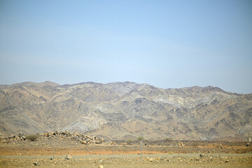 Fototapeta premium desert view with rocky mountains in the background in Mecca, Saudi Arabia