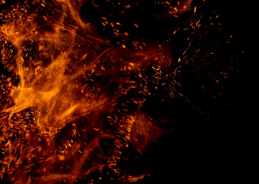 A black background with a lot of fire and smoke