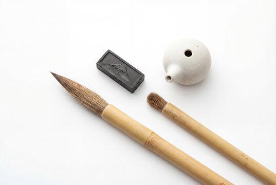 Traditional japanese calligraphy tools with brush, sumi ink and water dropper
