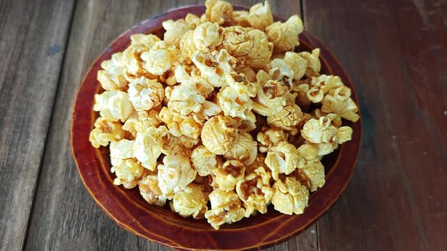 Pile of delicious popcorn in a border shape