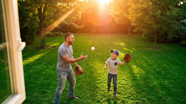 Father and son playing catch in a sunlit backyard, surrounded by lush green grass and trees, with a warm, golden sunset in the background