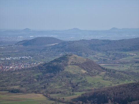 Germany, panoramic Limburg hill landscape with Swabian Alb mountains and Weilheim village on clear winter day