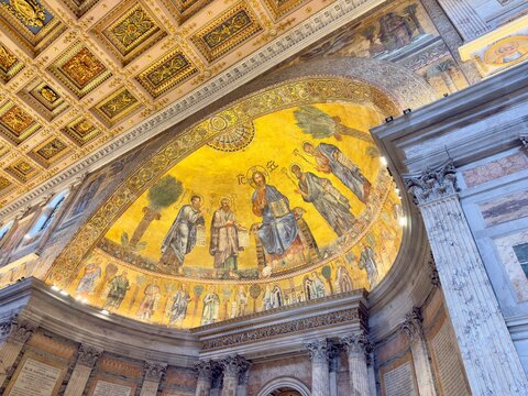 The golden mosaic apse inside the Papal Basilica of Saint Paul Outside the Walls, Rome, Italy