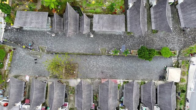 Top View of Authentic Batak Tribal Settlement Showing Curved Roof Architecture and Village Layout, Samosir, Indonesia