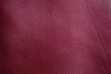 Fototapeta premium Deep red leather texture background close up