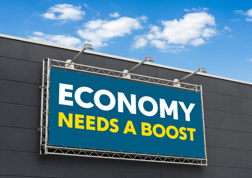 Economy Needs a Boost written on a billboard
