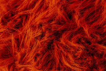 Obraz premium Warm vibrant deep red orange fluffy soft cozy textile material texture abstract surface background