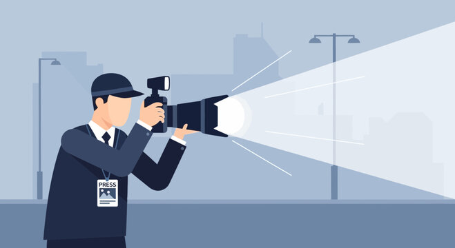 Man holding large flash photography equipment.
