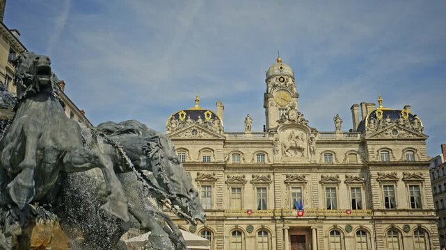 Historic Lyon City Hall and Bartholdi Fountain in France