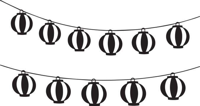 Black and white paper lanterns hanging on a string line decoration