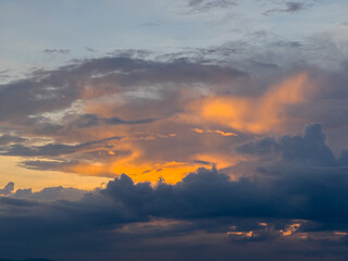 Fototapeta premium Dramatic Sunset Sky with Orange Clouds