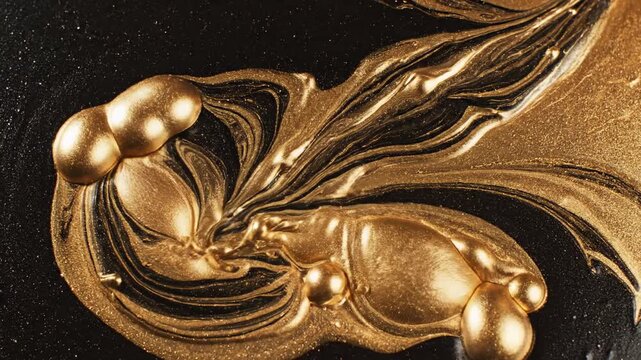 Entwining streams of opulent liquid gold and rich ebony paint create a dynamic, flowing abstract composition, showcasing luxurious textures and organic, swirling patterns that evoke a sense