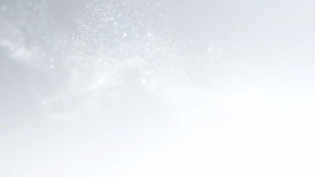 A delicate cascade of shimmering, ephemeral particles descends through a soft diffusion of ethereal light, creating an airy, luminous atmosphere perfect for conveying hope, dreams, or celestial