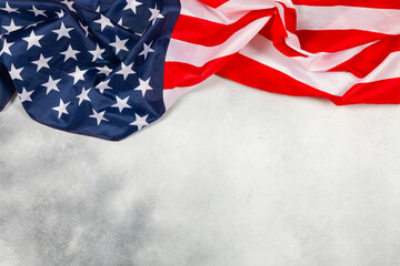 Obraz premium American flag on textured background. Memorial day, Independence Day and Veterans Day. American patriotism concept. Day of Remembrance and Honorary Banner. 4th of July celebration. Top view, space 