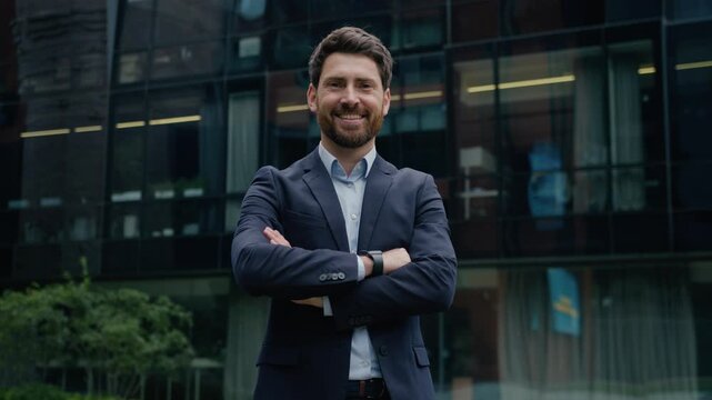 Confident Caucasian businessman portrait outdoor downtown smiling crossed arms happy business owner man looking at camera posing guy adult male leader broker trader investor salesman employer in city