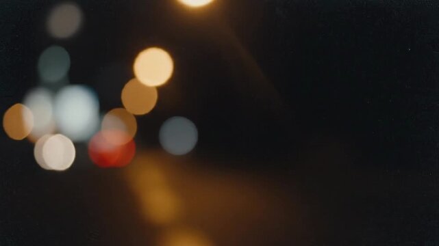Abstract bokeh nostalgic grainy background, moody film grain, dusk or night
