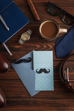 Father's Day concept flat lay with greeting card and accessories