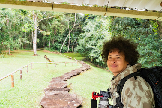 Visitor exploring San Agustin Archaeological Park monument