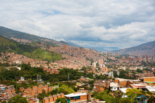 Panoramic view of Medellin nestled among lush hills