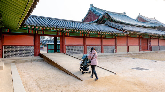 Woman exploring Changdeokgung Palace in Seoul
