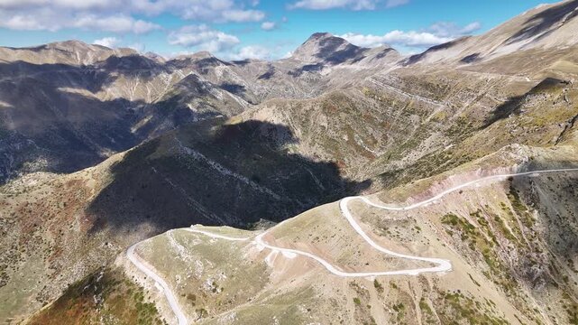 Sweeping mountain panorama with layered ridges from Greek mountain pass, Pindus, Epirus