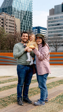 Family celebrating 11 month birthday at Seoul Plaza City Hall