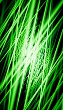 Abstract green light beam streak pattern on black background