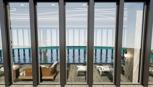 Modern indoor spa with pool view through tall glass panels