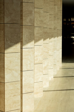 Modern architecture with sunlight on beige walls