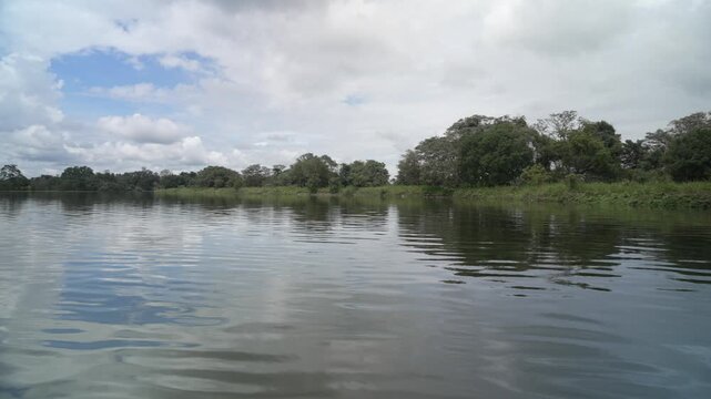 View of scenic boat safari on Hiriwadunna Wewa reservoir near Dambulla, Matale District, Sri Lanka, Asia