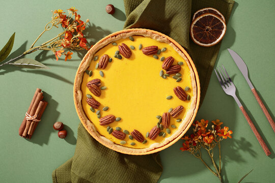 Pumpkin pie with pecans for Thanksgiving celebration