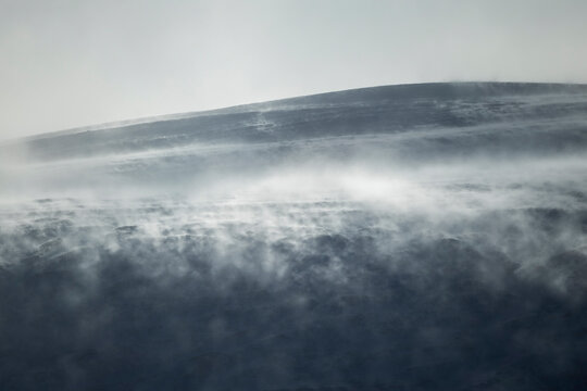 Winter snowstorm over Icelandic highland plateau landscape