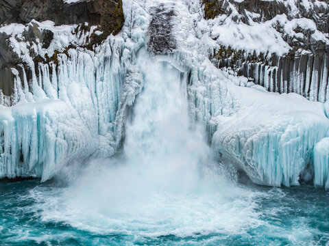 Winter ice and snow at Aldeyjarfoss waterfall, Iceland