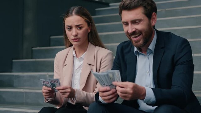 Caucasian colleagues business man woman count money salary financial inequality happy laughing male guy manager envy offended female girl coworkers holding banknotes rivalry cash discrimination city