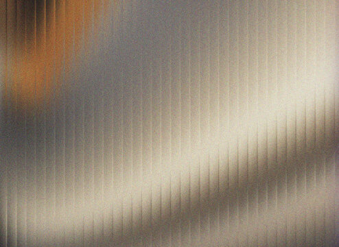 Warm metallic glass texture background with fluted vertical pattern.
