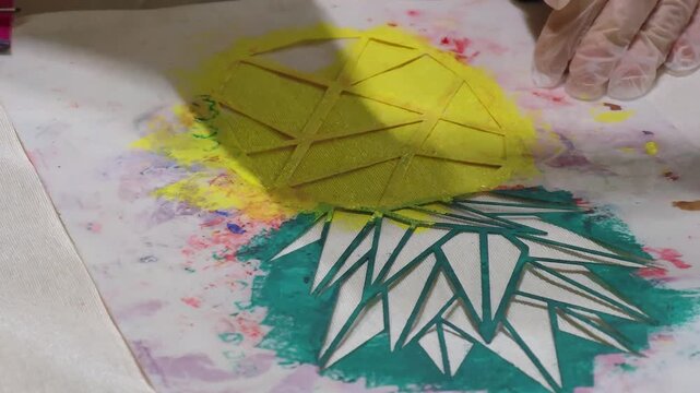 Stencil painting concept. Educational activity for children where they paint with colored paints. Creativity.