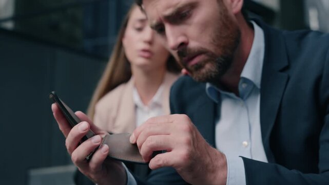 Caucasian desperate unemployment man dismissal box lost job woman support city outdoors fired male guy businessman holding empty wallet without money financial crisis business female girl calm friend