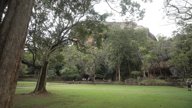 View of visitors heading to Lion Rock, Ancient Rock Fortress, Sigiriya, Sri Lanka, Asia