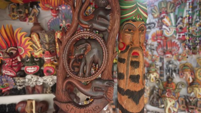 View of ornate wood carvings on souvenir stall near Lion Rock, Ancient Rock Fortress, Sigiriya, Sri Lanka, Asia