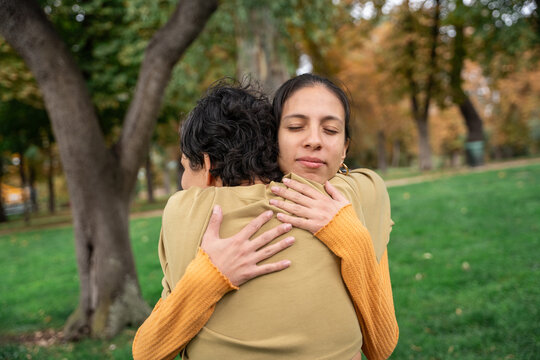Peaceful embrace at a spiritual retreat in autumn park