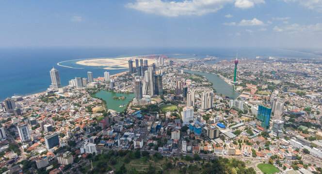 Drone Aerial View of Colombo, Sri Lanka, Modern Skyline and Colombo Port City Waterfront on the Indian Ocean, Panoramic Coastal Capital Cityscape with High-Rise Towers, Travel Destination Photo