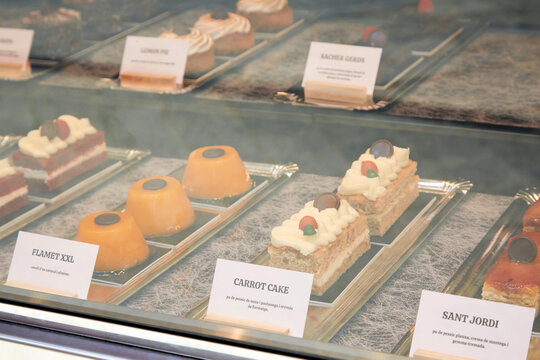 Assorted pastry and cake in bakery display case
