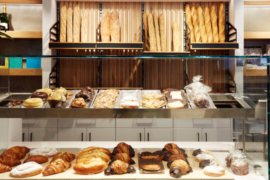 Fresh bakery counter with baguette and pastry display