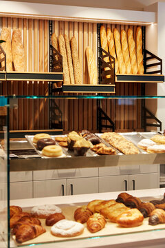 Bakery display with fresh baguette and pastry assortment