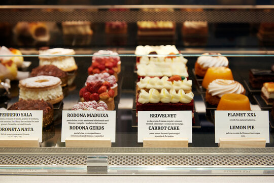Assorted pastry and cake in bakery display case