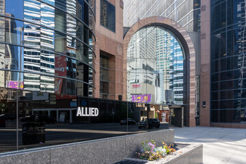 Fototapeta premium Toronto, Canada - May 18, 2026: A signage for Allied at an office building in Toronto, Canada. Allied Properties REIT is a leading owner and developer of urban office space that enhances profi