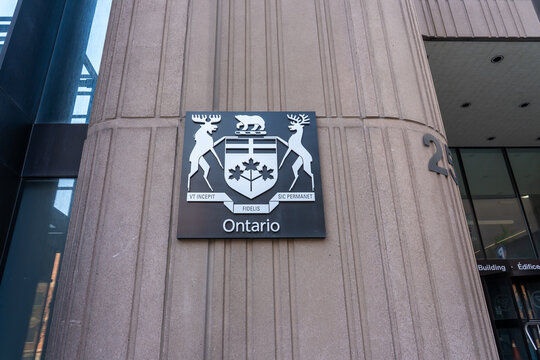 Toronto, Ontario, Canada - May 18, 2026: A coat of arms of Ontario on the building in Toronto, Ontario, Canada. The coat of arms of Ontario is the armorial emblem representing the Canadian province of