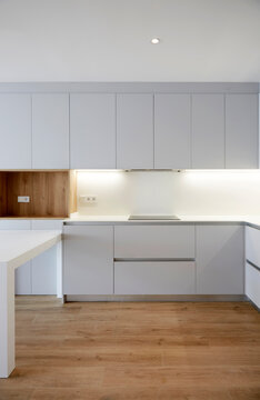 Modern minimalist kitchen interior with white cabinet