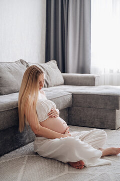 Serene morning of a pregnant woman at home